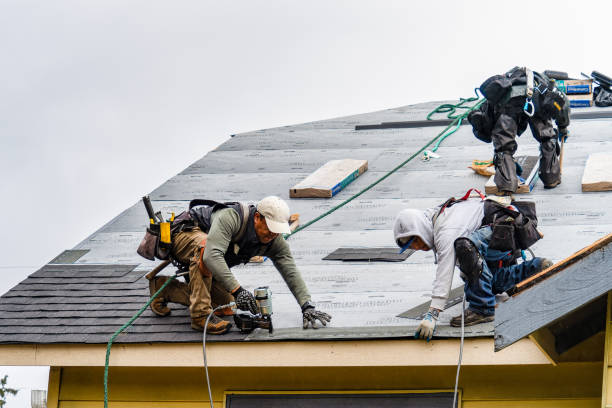 Professional Roof Installation technician working in Achille, OK